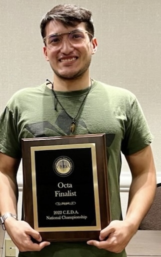 Team captain Luis Toro with his commemorative plaque.